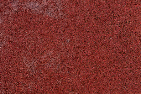 Close up of red rubber floor. Outdoor decoration. Sports running trailの写真素材