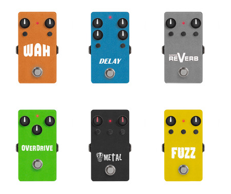 guitar effect pedals on white