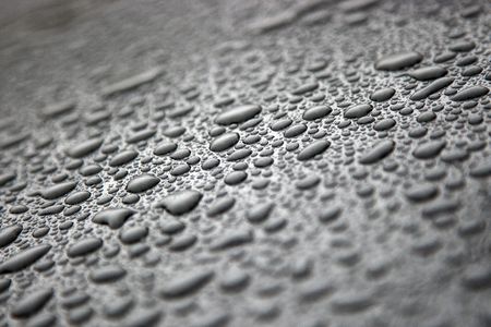 Gray background with drops of water 