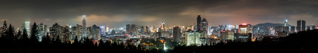 Wide panorama of Xiamen cityscape at nightのeditorial素材