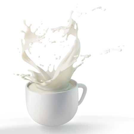 splash of white fat milk in round cup on white backgroundの写真素材