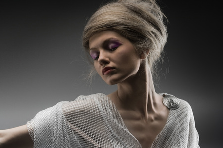 fashion beautiful glamour girl with silver fishnet creative stylized hairの写真素材