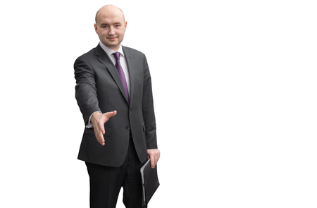 A businessman with open hand ready to seal a deal on white background. Focus on a hand.の写真素材