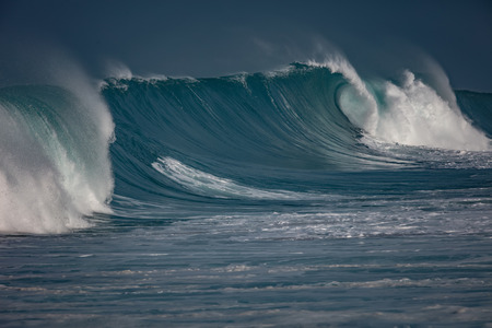 Huge waves crashing in ocean. Seascape environment background. Water texture with foam and splashes. Hawaiian surfing spots with nobodyの写真素材