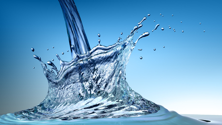 Pouring water and splashの写真素材