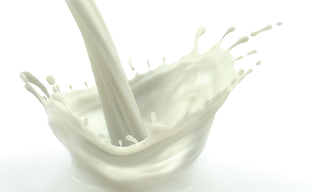 Pouring splashed milk on light white backgroundの写真素材