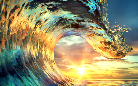 Colorful Ocean Wave. Sea water in crest shape. Sunset light and beautiful clouds on background