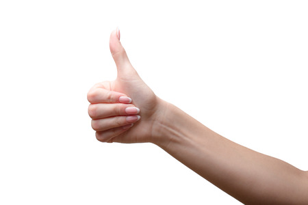 Female right hand thumb up sign isolated on white backgroundの写真素材