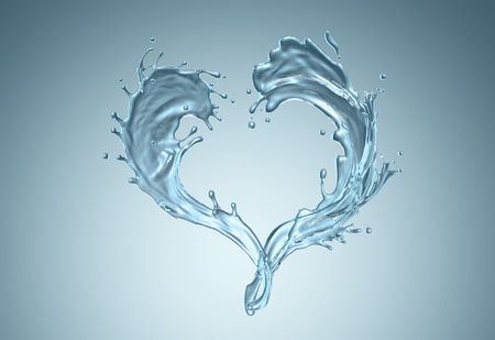Water splashes in shape of a hearth against backgroundの写真素材