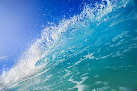 Shorebreak surfing wave, ocean water background, tropical seaの写真素材