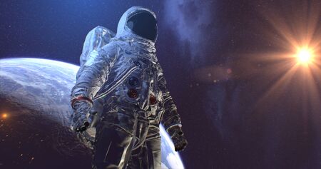 Astronaut Neil Armstrong, spacewalk on the Moon surface watching planet Earth from space.の写真素材