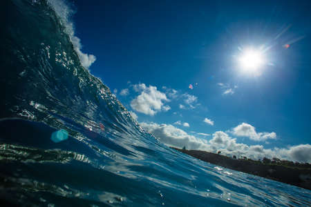 Surfer ocean wave in Baliの写真素材
