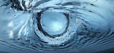 Water background, an Eye of The God of Water splashedの写真素材