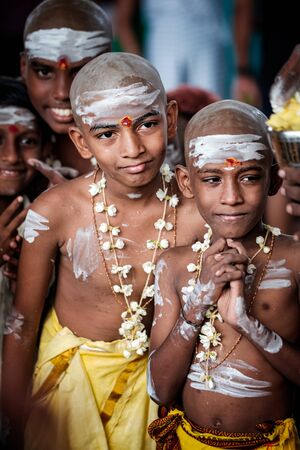 Close-up of a group of young boy devotees in Thaipusam Festival.のeditorial素材