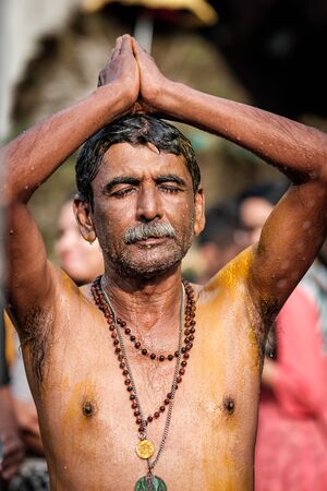 Close-up of praying men devotee in Thaipusam Festival.のeditorial素材