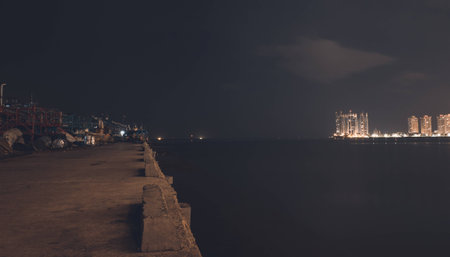 On The Sea Front With View Between Luxury and Povertyの写真素材