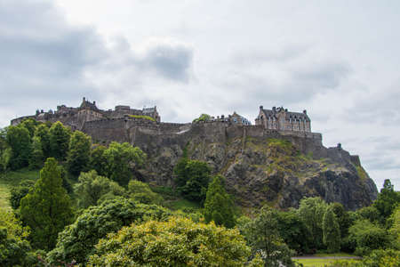 Edinburgh castle on top mountain from farのeditorial素材