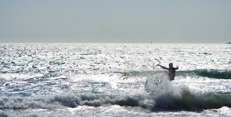 Kitesurfer and wavesの写真素材