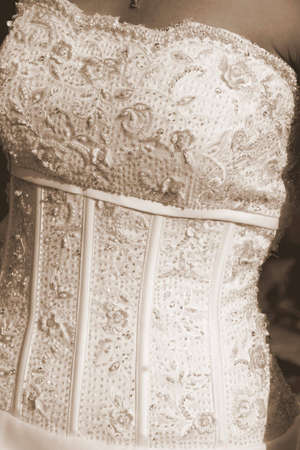 Portrait of a wedding dress in sepia format