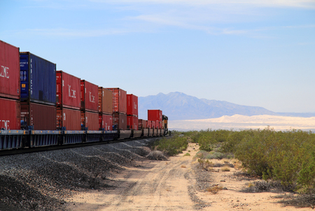 MOJAVE NATIONAL PRESERVE, CA - MARCH 27: A Union Pacific freight train traverses the vast California desert March 27, 2016 in Mojave National Preserve, CAのeditorial素材