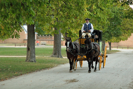 The horse and carriage was a primary method of transportation used by the Virginia colonists October 6, 2017 in Williamsburg, VAのeditorial素材