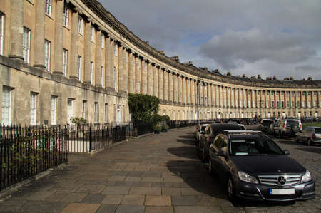The Royal Crescent, designed by famed English architect John Wood, is a notable landmark located in the medieval city of Bath, Englandのeditorial素材