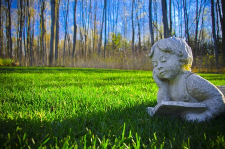 boy Statue Enjoying Bookの写真素材