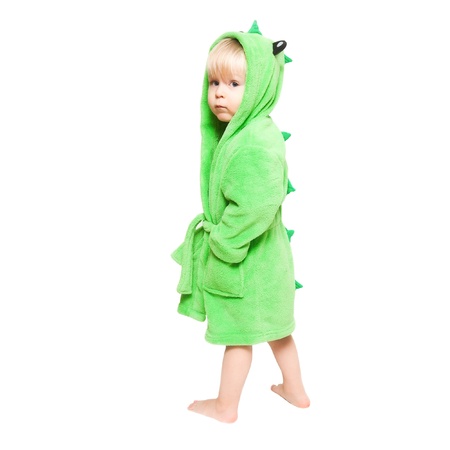 The little boy standing in green dressing gown like dragonの写真素材