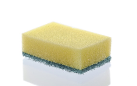 Kitchen sponge on the white background.