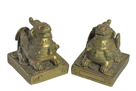 Chinese lion sculpture on white background.の写真素材