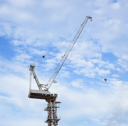 Crane on blue sky background の写真素材