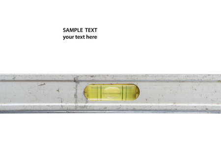 Close up of used and dirty spirit builder level with sample text. select focus on bubble.