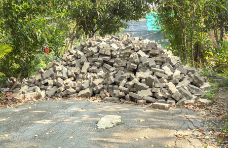 Pile of brick on the road.