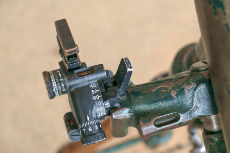 Close up guidance system of old artillery gun.