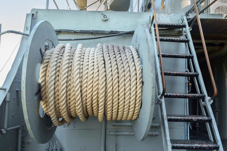 Large roll of rope on the big boat, shipboard equipment.