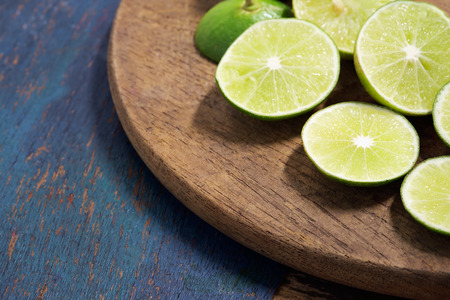 Lime slice on wood background.の写真素材