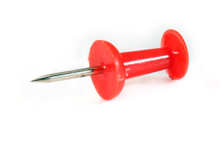 Red pushpin on white background.の写真素材
