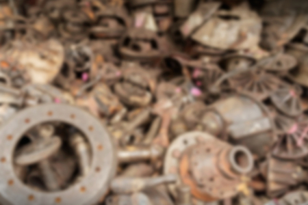 Blur of pile of rusty machine, part of car for recycle.の写真素材