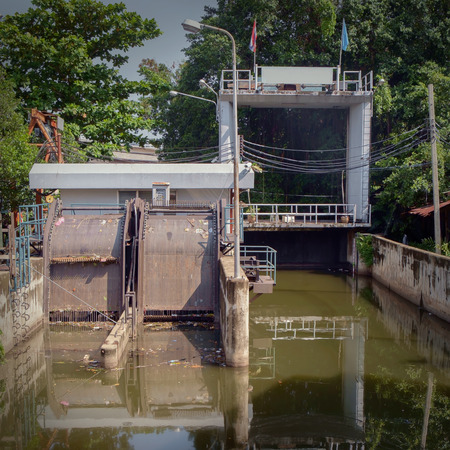 Old and dirty floodgate in cannel.の写真素材