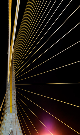 Image of slings stretched on the Rama 8 bridge at night, Bangkok, Thailand.の写真素材