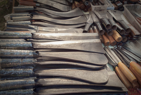 Heap of big knife in the market.
