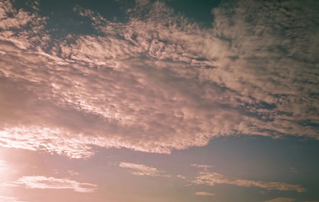 Sky with clouds. Warm tone.の写真素材