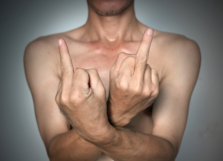 Close up man show middle finger.の写真素材