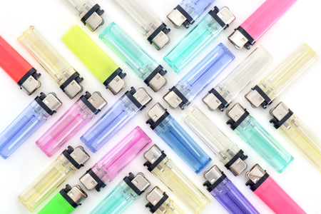 Cigarette lighter on white paper background. Top view. Flat lay.の写真素材