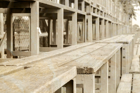 View of empty dirty bleachers. Vintage grunge style.の写真素材
