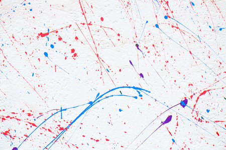 Abstract colorful splash on white wall background.の写真素材