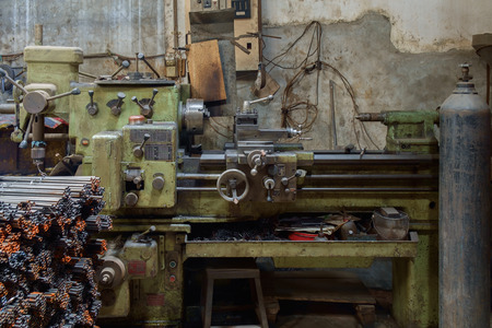 Old and dirty lathe machine.の写真素材