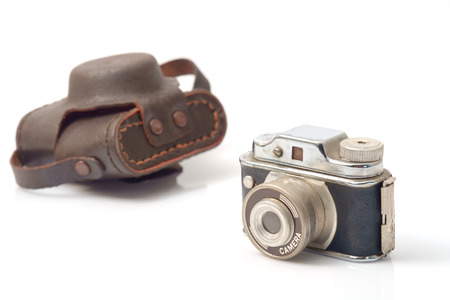 Vintage toy, camera on white background.