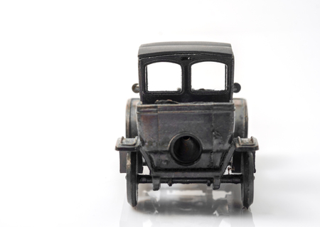 Toy vintage car on white background.の写真素材
