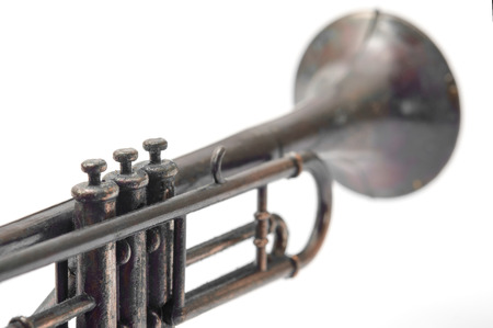Vintage toy, closeup trumpet on white background.の写真素材